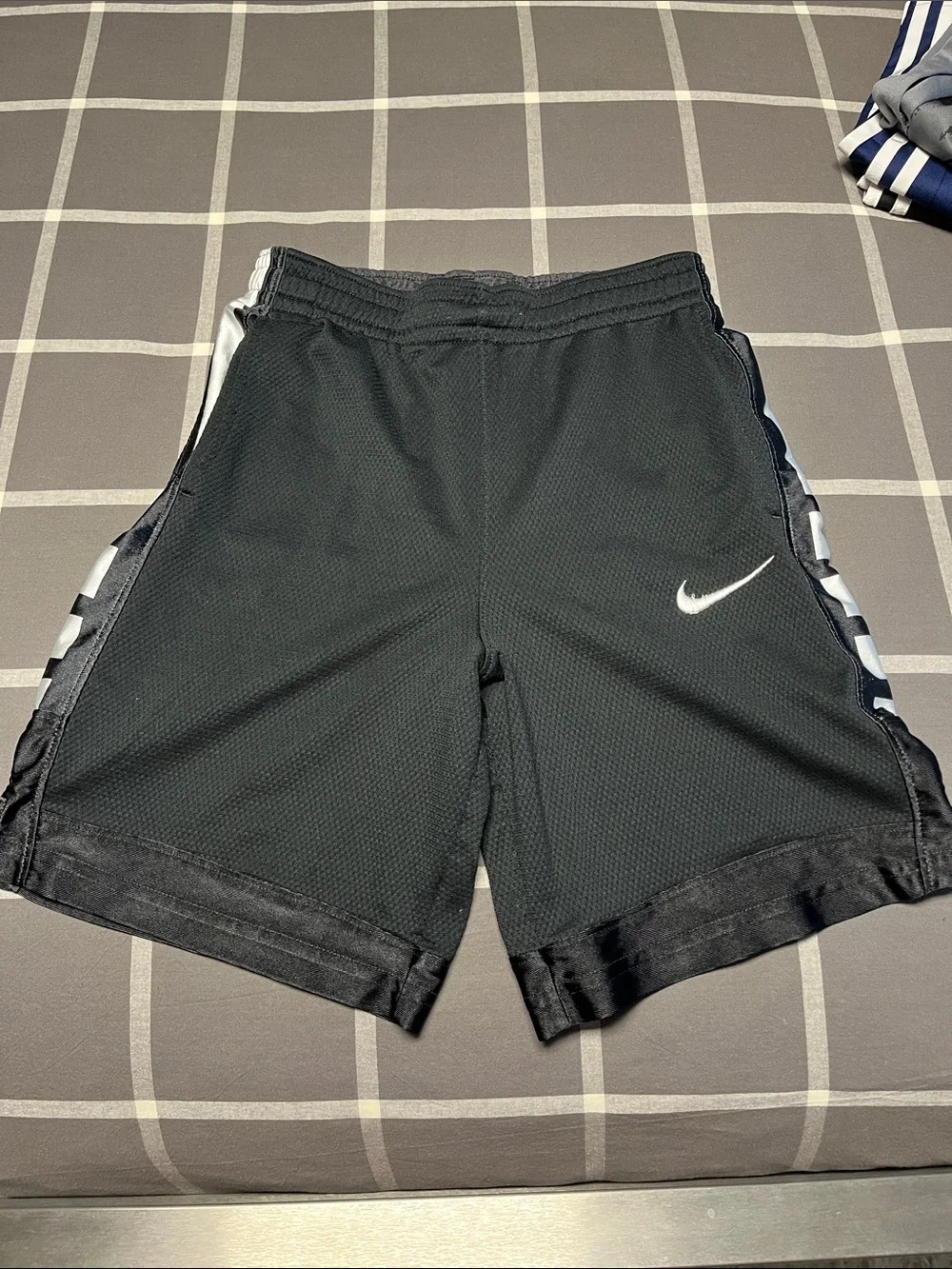 Nike Black Athletic Basketball Shorts with White Swoosh